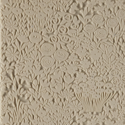 Texture Tile - Field of Flowers. Beige Texture Tiles are flexible, washable and can be used with any soft clay. Spritz with CoolSlip or dust on Dry Powder Release for stick-free impressions when using metal clay and polymer clay.