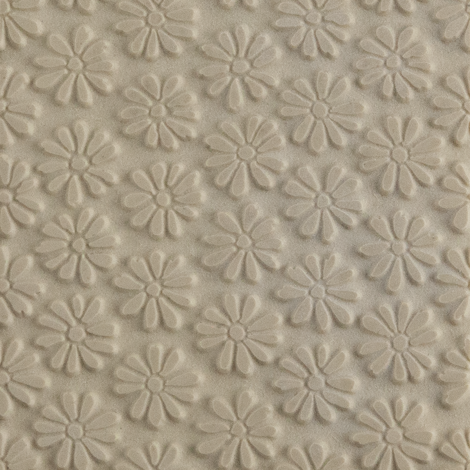 Texture Tile - Upsy Daisy. Beige Texture Tiles are flexible, washable and can be used with any soft clay. Spritz with CoolSlip or dust on Dry Powder Release for stick-free impressions when using metal clay and polymer clay.