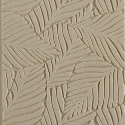 Texture Tile - Palm Leaves. Beige Texture Tiles are flexible, washable and can be used with any soft clay. Spritz with CoolSlip or dust on Dry Powder Release for stick-free impressions when using metal clay and polymer clay.