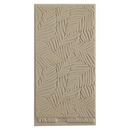 Texture Tile - Palm Leaves. Beige Texture Tiles are flexible, washable and can be used with any soft clay. Spritz with CoolSlip or dust on Dry Powder Release for stick-free impressions when using metal clay and polymer clay.