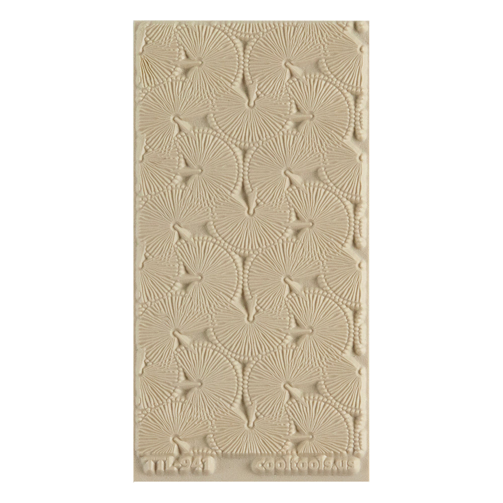 Texture Tile - Palm Branches. Texture Tiles are flexible, washable and can be used with any soft clay. Spritz with CoolSlip or dust on Dry Powder Release for stick-free impressions when using metal clay and polymer clay.