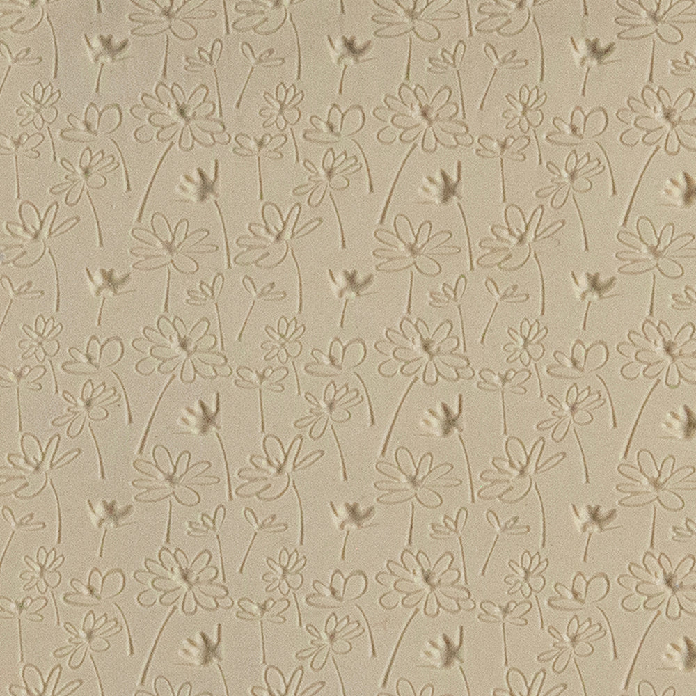 Texture Tile - Fresh as a Daisy Embossed. Texture Tiles are flexible, washable and can be used with any soft clay. Spritz with CoolSlip or dust on Dry Powder Release for stick-free impressions when using metal clay and polymer clay.