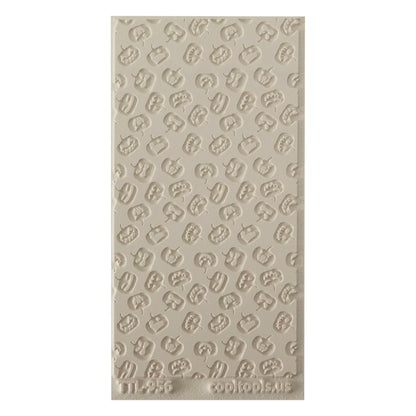 Texture Tile - Carved Pumpkins Embossed. Beige Texture Tiles are flexible, washable and can be used with any soft clay. Spritz with CoolSlip or dust on Dry Powder Release for stick-free impressions when using metal clay and polymer clay.