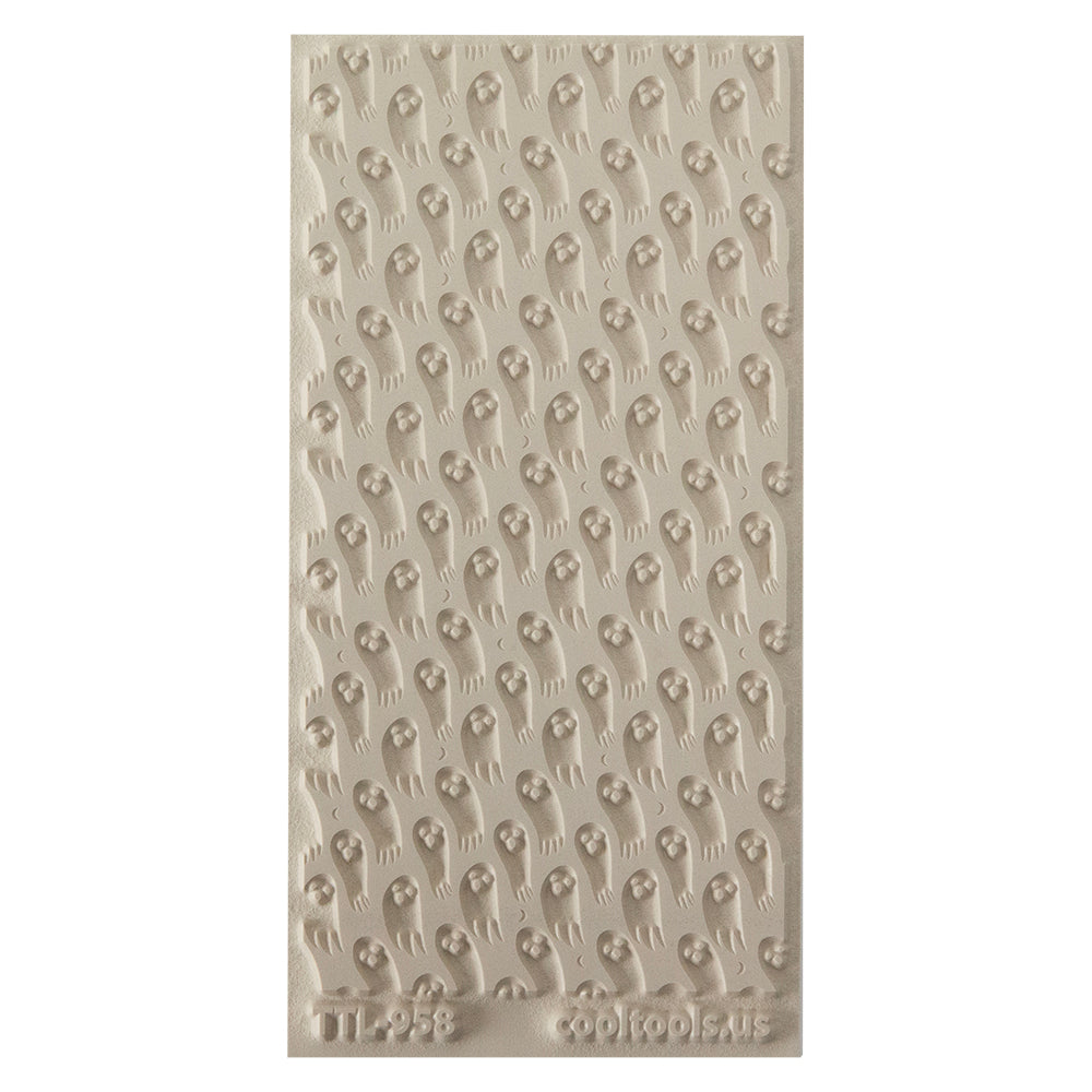 Texture Tile - Ghostly Night Embossed. Beige Texture Tiles are flexible, washable and can be used with any soft clay. Spritz with CoolSlip or dust on Dry Powder Release for stick-free impressions when using metal clay and polymer clay.