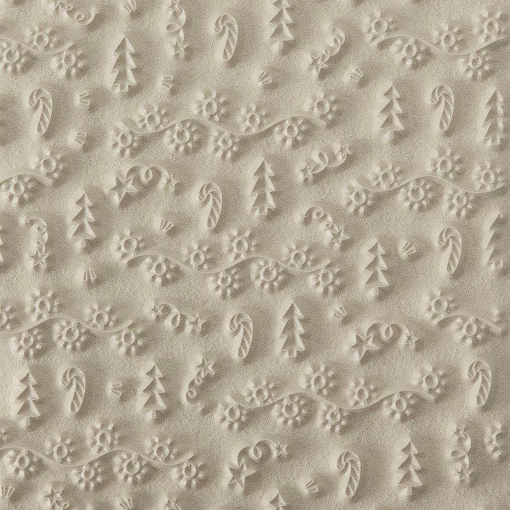 Texture Tile - Merry & Bright. Beige Texture Tiles are flexible, washable and can be used with any soft clay. Spritz with CoolSlip or dust on Dry Powder Release for stick-free impressions when using metal clay and polymer clay.