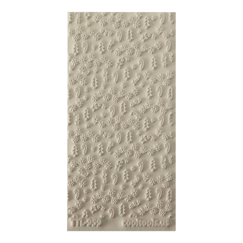 Texture Tile - Merry & Bright. Beige Texture Tiles are flexible, washable and can be used with any soft clay. Spritz with CoolSlip or dust on Dry Powder Release for stick-free impressions when using metal clay and polymer clay.