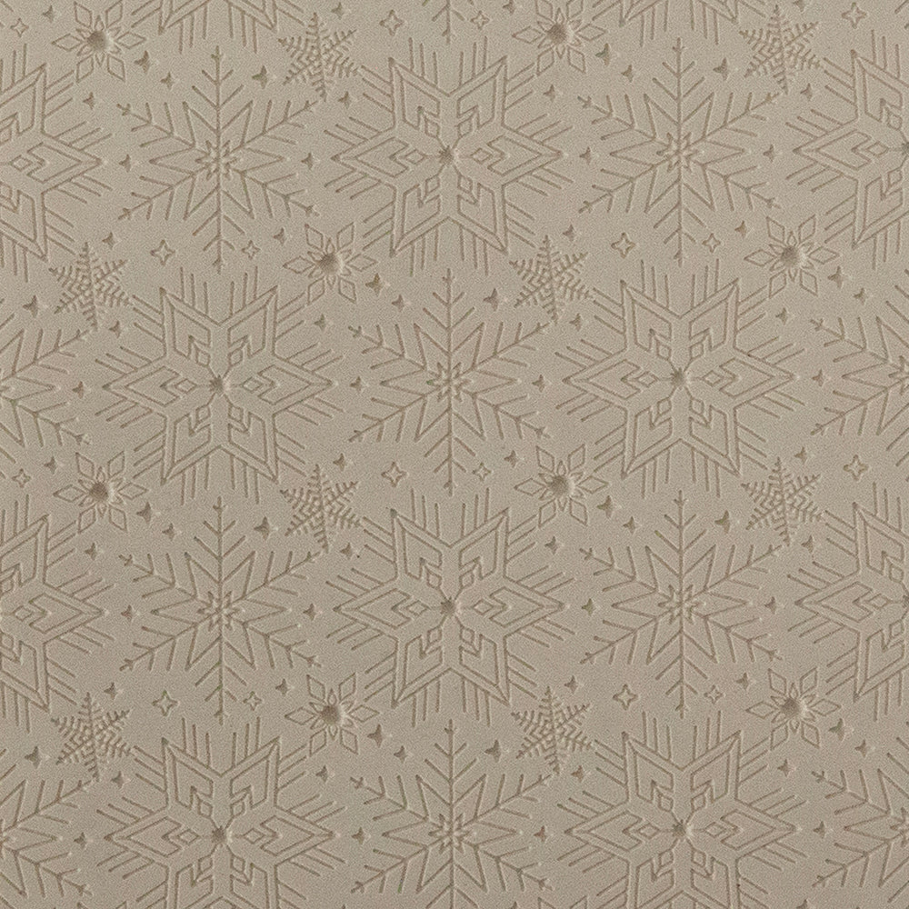 Texture Tile - Snowflakes Embossed. Beige Texture Tiles are flexible, washable and can be used with any soft clay. Spritz with CoolSlip or dust on Dry Powder Release for stick-free impressions when using metal clay and polymer clay.