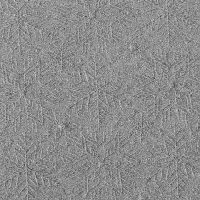 Texture Tile - Snowflakes Embossed sample rolled into clay