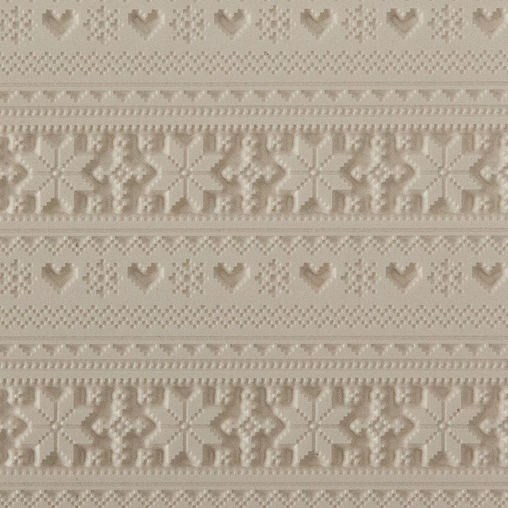 Texture Tile - Christmas Sweater Embossed. Beige Texture Tiles are flexible, washable and can be used with any soft clay. Spritz with CoolSlip or dust on Dry Powder Release for stick-free impressions when using metal clay and polymer clay.