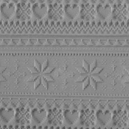 Texture Tile - Christmas Sweater sample rolled into clay