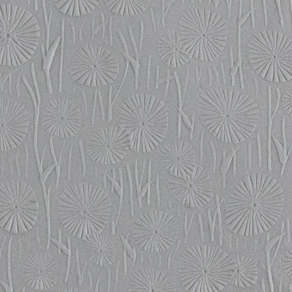 Texture Tile - Dandelion Field Embossed sample rolled into clay