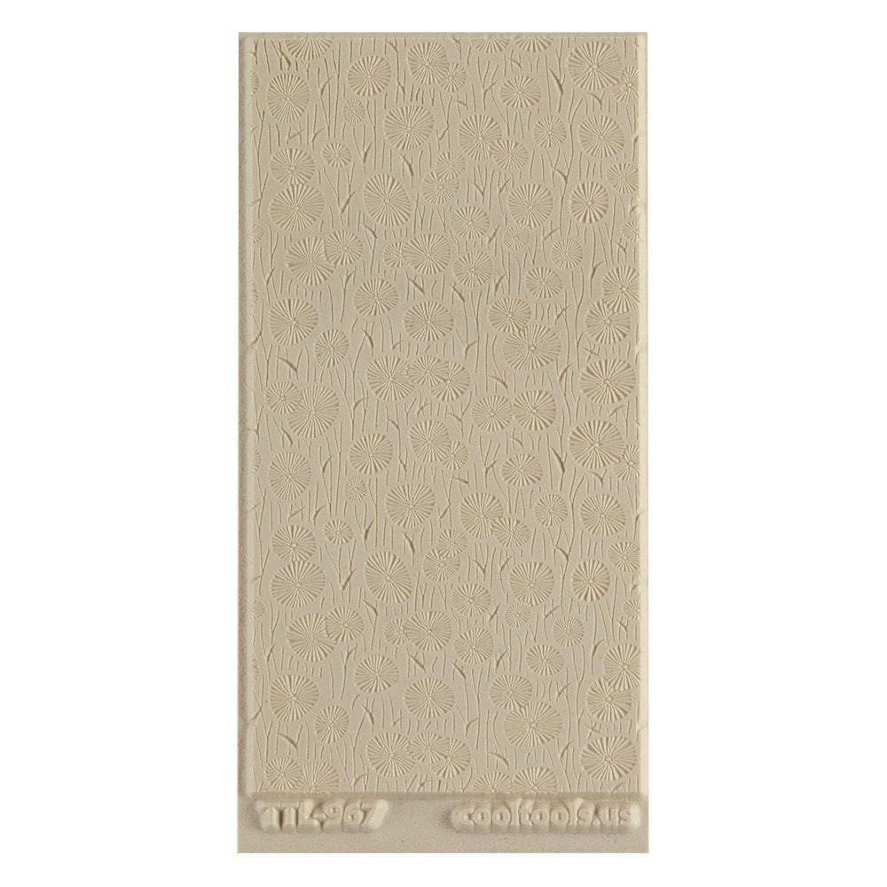 Texture Tile - Dandelion Field Embossed. Texture Tiles are flexible, washable and can be used with any soft clay. Spritz with CoolSlip or dust on Dry Powder Release for stick-free impressions when using metal clay and polymer clay.