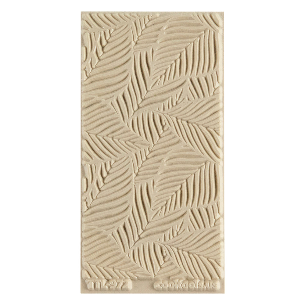 Texture Tile - Palm Leaves Embossed. Texture Tiles are flexible, washable and can be used with any soft clay. Spritz with CoolSlip or dust on Dry Powder Release for stick-free impressions when using metal clay and polymer clay.