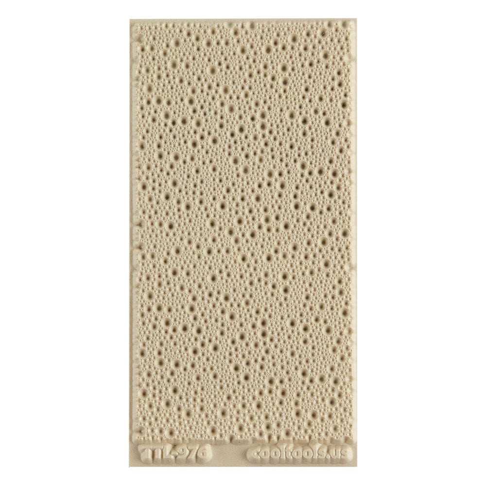 Texture Tile - Suds Embossed. Texture Tiles are flexible, washable and can be used with any soft clay. Spritz with CoolSlip or dust on Dry Powder Release for stick-free impressions when using metal clay and polymer clay.