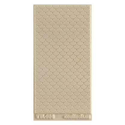Texture Tile - Scales Embossed. Texture Tiles are flexible, washable and can be used with any soft clay. Spritz with CoolSlip or dust on Dry Powder Release for stick-free impressions when using metal clay and polymer clay.