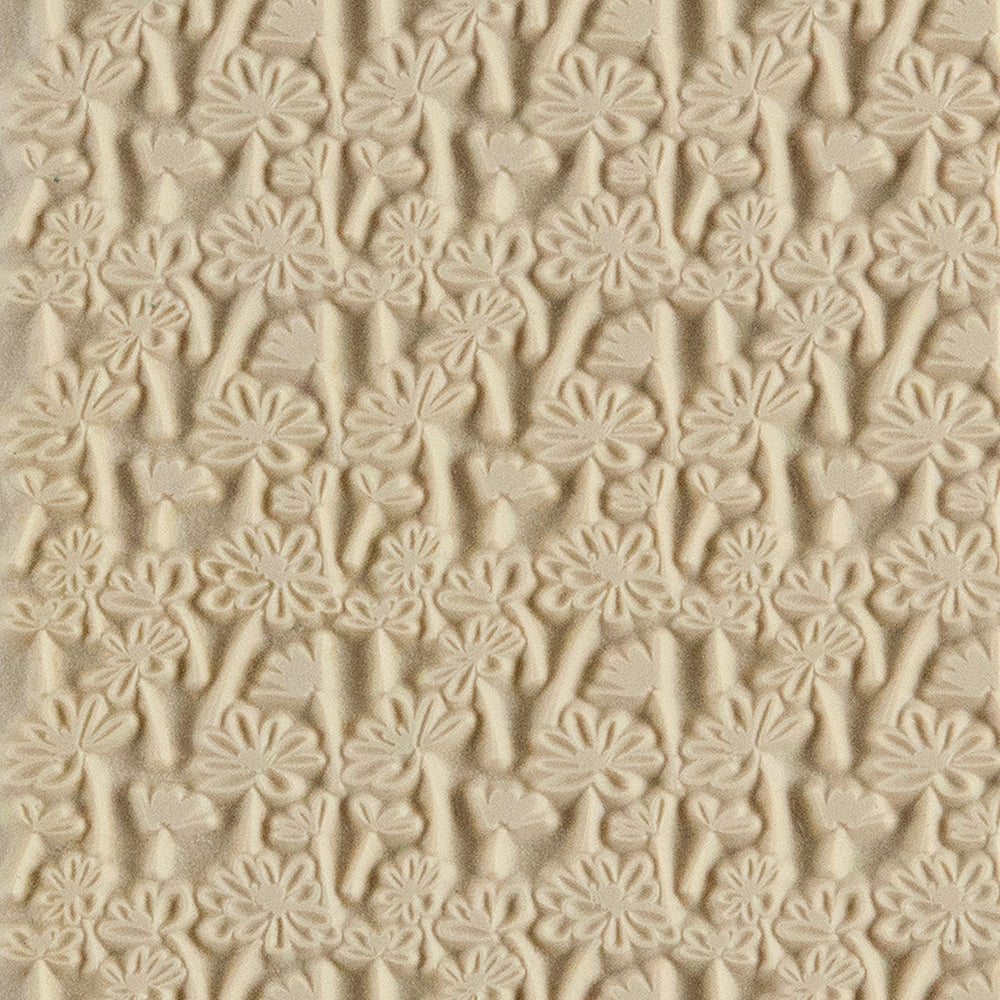 Texture Tile - Fresh as a Daisy. Texture Tiles are flexible, washable and can be used with any soft clay. Spritz with CoolSlip or dust on Dry Powder Release for stick-free impressions when using metal clay and polymer clay.