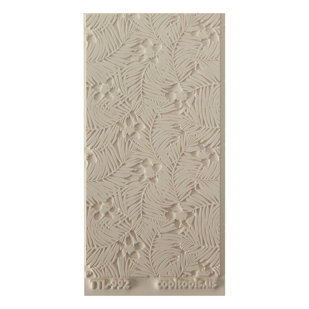 Texture Tile - Christmas in Hawaii Embossed. Beige Texture Tiles are flexible, washable and can be used with any soft clay. Spritz with CoolSlip or dust on Dry Powder Release for stick-free impressions when using metal clay and polymer clay.