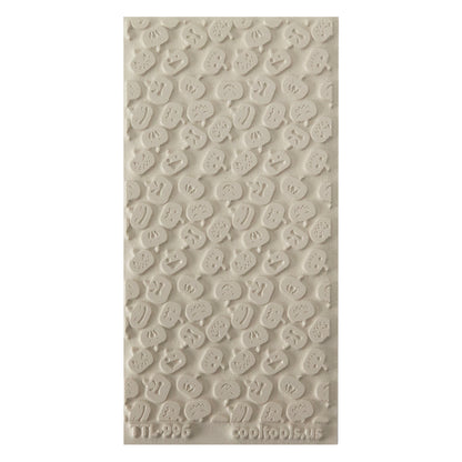 Texture Tile - Carved Pumpkins. Beige Texture Tiles are flexible, washable and can be used with any soft clay. Spritz with CoolSlip or dust on Dry Powder Release for stick-free impressions when using metal clay and polymer clay.