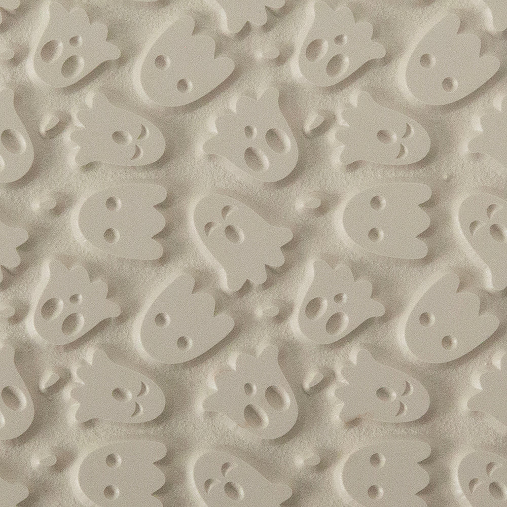 Texture Tile - Ghoulfriends. Beige Texture Tiles are flexible, washable and can be used with any soft clay. Spritz with CoolSlip or dust on Dry Powder Release for stick-free impressions when using metal clay and polymer clay.