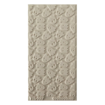 Texture Tile - Ghoulfriends. Beige Texture Tiles are flexible, washable and can be used with any soft clay. Spritz with CoolSlip or dust on Dry Powder Release for stick-free impressions when using metal clay and polymer clay.