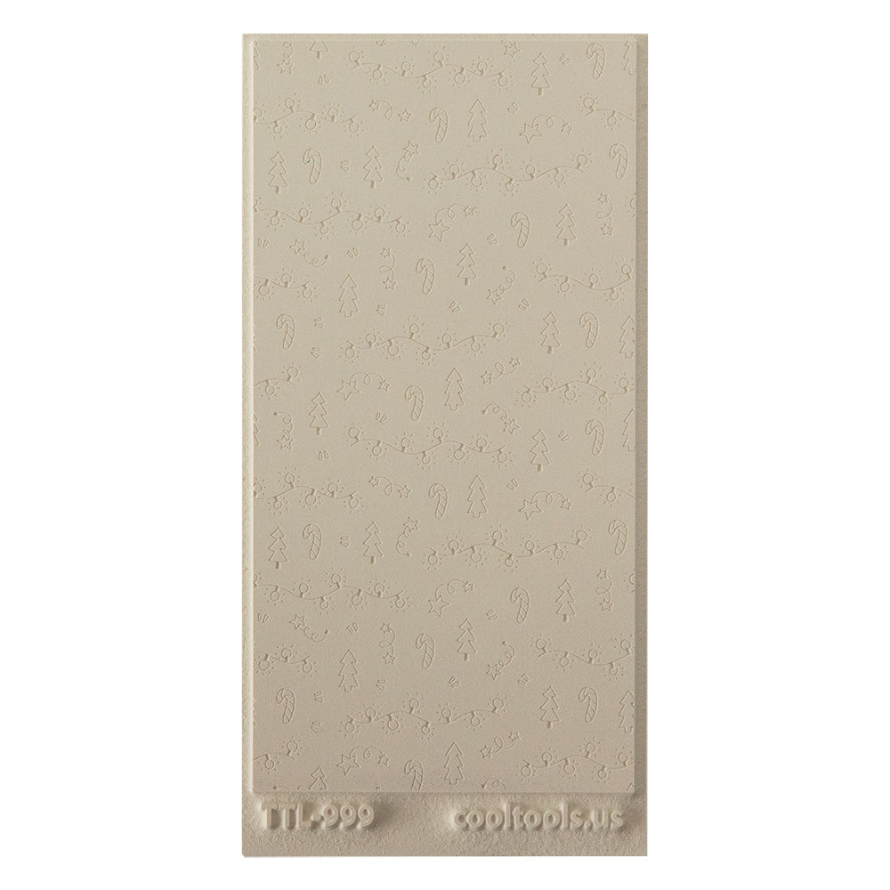 Texture Tile - Merry & Bright Embossed. Beige Texture Tiles are flexible, washable and can be used with any soft clay. Spritz with CoolSlip or dust on Dry Powder Release for stick-free impressions when using metal clay and polymer clay.