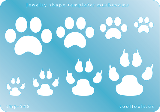 Blue plastic Jewelry Shape Template - Paw Prints Our special surface makes it easy to find these templates on your workbench, but allows clarity for positioning. Use smaller shapes for embossing or enamel stencils. Includes 8 paw print shapes. Sizes are from 14mm to 37mm.