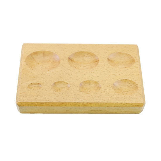 Dapping Block - Hardwood - Medium Oval Made of hardwood to prevent scratching or marring. The forming block measures 6-1/4" x 4" x 1"