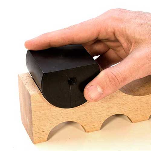 person demonstrating the Forming Block Set - Hardwood - Curve Bending 