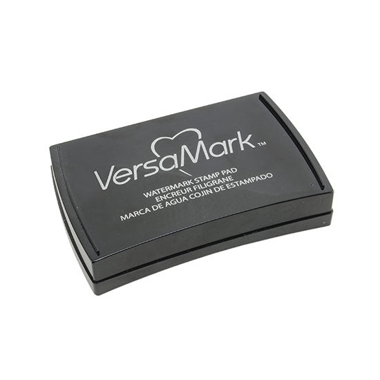 VersaMark - Watermark Stamp Pad VersaMark is a non-toxic watermark stamp pad that creates translucent images. Great for background images. The stamp pad is acid-free, water-based and non-toxic.