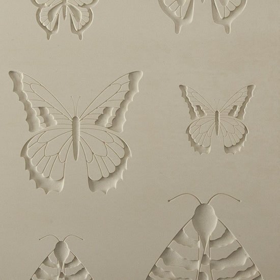 Jewelry Artist Elements - Texture - Butterfly 4. Embossed elements. Impress clay, then use a Jewelry Shape Template for the shape or cut out with a needle tool. Jewelry Artist Elements are flexible, washable and can be used with any soft clay. Spritz with CoolSlip or dust on Dry Powder Release for stick-free impressions when using metal clay and polymer clay.