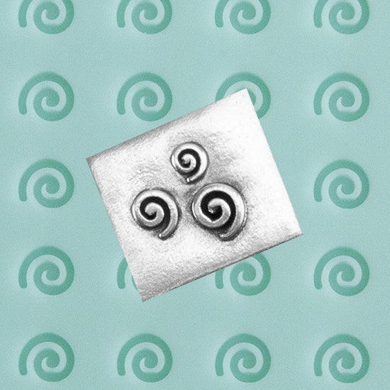 Finishing Touches Mold - Spiral with silver sample -Cool Tools Finishing Touches are silicone molds specially designed to create precise and repeatable shapes and adornments for metal clay and polymer clay. Each mold is perfectly calibrated for jewelry and jewelry components.