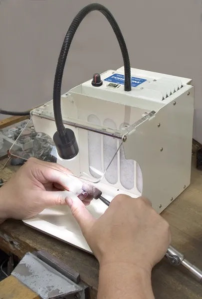 person using Foredom® Polishing Lathe Filter Hood