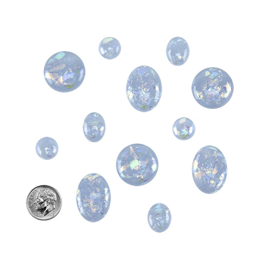 various sizes and shapes of Dichroic Cabochons - Neo Lavender with dime