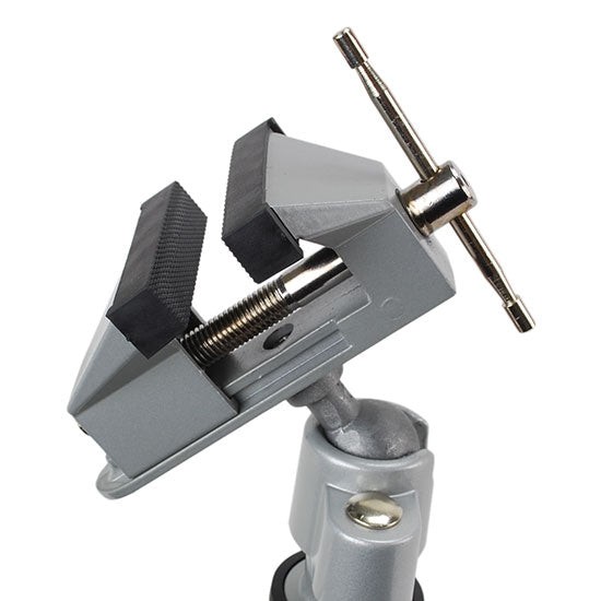 Economy Tabletop Swivel Vise The jaws open up to 2-1/4" wide and are lined with tough rubber that will not scratch precious metals. The clamp opens up to 2-1/8" wide to fit any bench or table. The ball and socket configuration allows the jaws to be tilted and rotate 360 degrees as the jaws hold firmly in place at any angle.