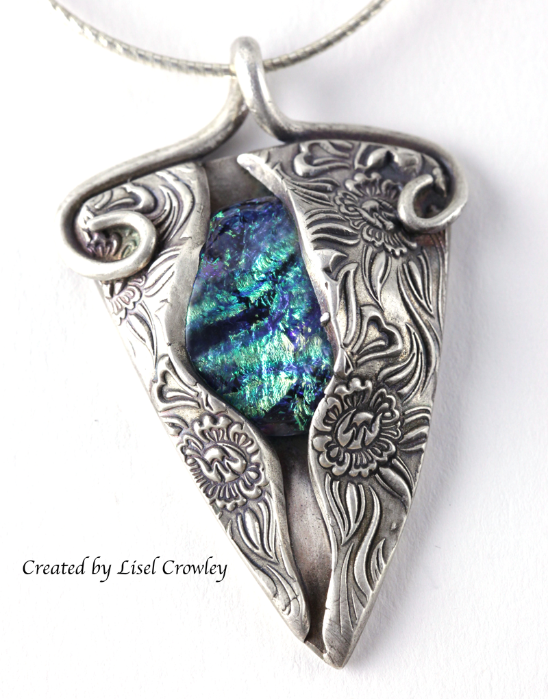 silver pendant with dichroic cabochon created by lisel crowly