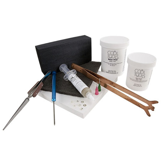 Silver and Gold Soldering Kit Includes: Hard Solderite Soldering Pad Charcoal Block Copper Pickle Tongs (may be curved or fishtail) Crosslock Tweezers 1/2oz Hard Paste Solder Boric Acid SilverPrep Natural Pickle Mix Titanium Solder Pick 6 Sterling Earposts with 6mm Pads Scotchbrite