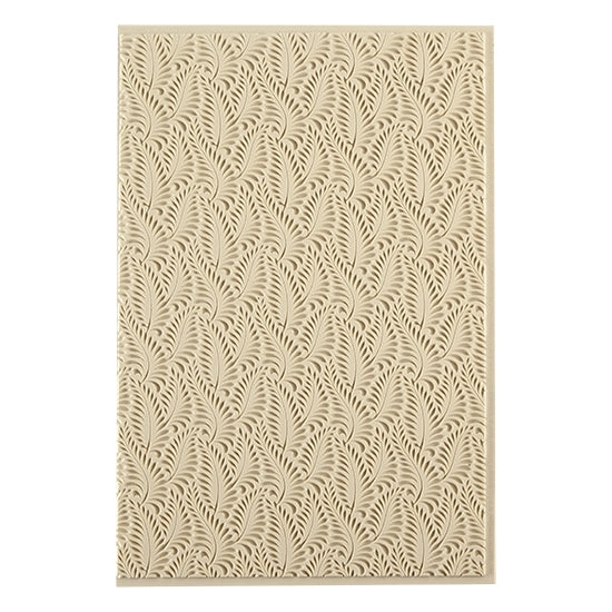 Mega Texture Tile - Crown Fern Embossed. Use to impress texture in soft clays. Mega Texture Tiles are perfect for projects both large and small. Mega Tiles measure 9-1/4" x 6" and are about 7 times larger than Texture Tiles. These textures are flexible, washable and can be used with any soft clay.