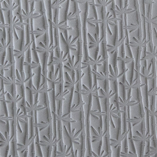 sample in clay of Mega Texture Tile - Bamboo Use to impress texture in soft clays. Mega Texture Tiles are perfect for projects both large and small. Mega Tiles measure 9-1/4" x 6" and are about 7 times larger than Texture Tiles. These textures are flexible, washable and can be used with any soft clay.