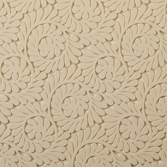 Mega Texture Tile - Fiddlehead Fern. Use to impress texture in soft clays. Mega Texture Tiles are perfect for projects both large and small. Mega Tiles measure 9-1/4" x 6" and are about 7 times larger than Texture Tiles. These textures are flexible, washable and can be used with any soft clay.