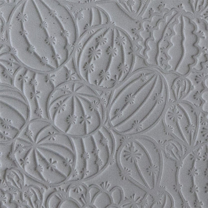 sample in clay of Mega Texture Tile - Don't Get Poked. Use to impress texture in soft clays. Mega Texture Tiles are perfect for projects both large and small. Mega Tiles measure 9-1/4" x 6" and are about 7 times larger than Texture Tiles. These textures are flexible, washable and can be used with any soft clay.