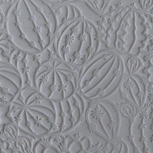 sample in clay of Mega Texture Tile - Don't Get Poked. Use to impress texture in soft clays. Mega Texture Tiles are perfect for projects both large and small. Mega Tiles measure 9-1/4" x 6" and are about 7 times larger than Texture Tiles. These textures are flexible, washable and can be used with any soft clay.