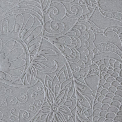 sample in clay of Mega Texture Tile - Jungle Love Fineline. Use to impress texture in soft clays. Mega Texture Tiles are perfect for projects both large and small. Mega Tiles measure 9-1/4" x 6" and are about 7 times larger than Texture Tiles. These textures are flexible, washable and can be used with any soft clay.