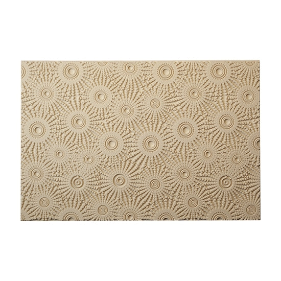 Mega Texture Tile - Sun Spots. Use to impress texture in soft clays. Mega Texture Tiles are perfect for projects both large and small. Mega Tiles measure 9-1/4" x 6" and are about 7 times larger than Texture Tiles. These textures are flexible, washable and can be used with any soft clay.