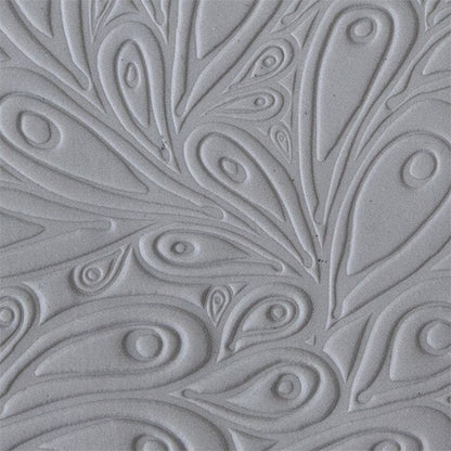 sample in clay of Mega Texture Tile - Peacock Embossed. Use to impress texture in soft clays. Mega Texture Tiles are perfect for projects both large and small. Mega Tiles measure 9-1/4" x 6" and are about 7 times larger than Texture Tiles. These textures are flexible, washable and can be used with any soft clay.