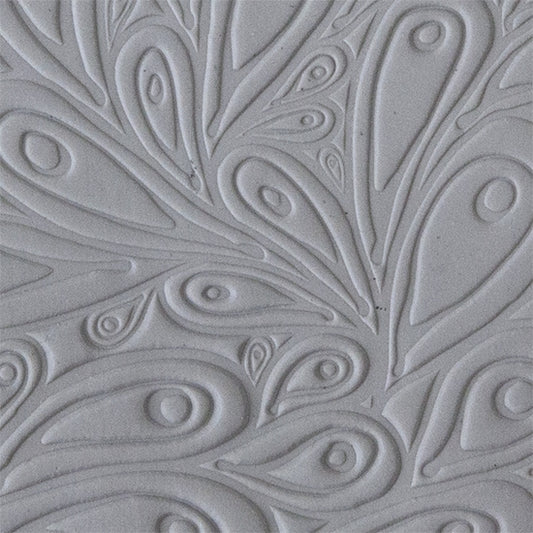 sample in clay of Mega Texture Tile - Peacock Embossed. Use to impress texture in soft clays. Mega Texture Tiles are perfect for projects both large and small. Mega Tiles measure 9-1/4" x 6" and are about 7 times larger than Texture Tiles. These textures are flexible, washable and can be used with any soft clay.