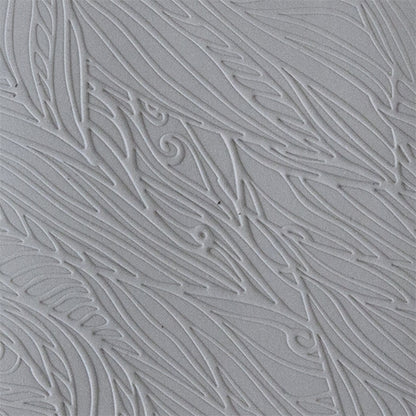 sample in clay Mega Texture Tile - Blowing in the Wind Fineline. Use to impress texture in soft clays. Mega Texture Tiles are perfect for projects both large and small. Mega Tiles measure 9-1/4" x 6" and are about 7 times larger than Texture Tiles. These textures are flexible, washable and can be used with any soft clay.