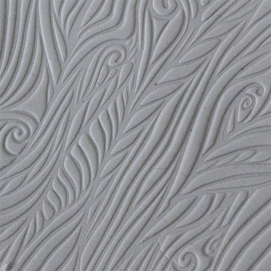 sample in clay Mega Texture Tile - Blowing in the Wind. Use to impress texture in soft clays. Mega Texture Tiles are perfect for projects both large and small. Mega Tiles measure 9-1/4" x 6" and are about 7 times larger than Texture Tiles. These textures are flexible, washable and can be used with any soft clay.