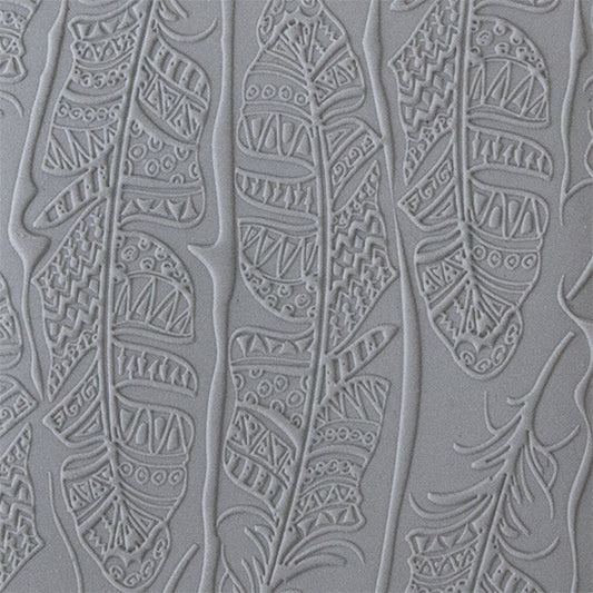 sample of Mega Texture Tile - Tribal Feather Fineline. Use to impress texture in soft clays. Mega Texture Tiles are perfect for projects both large and small. Mega Tiles measure 9-1/4" x 6" and are about 7 times larger than Texture Tiles. These textures are flexible, washable and can be used with any soft clay.