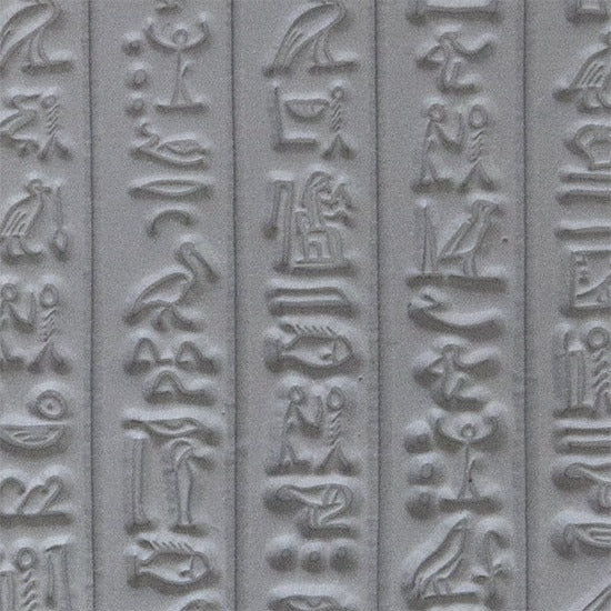 sample in clay of Mega Texture Tile - Hieroglyphics. Use to impress texture in soft clays. Mega Texture Tiles are perfect for projects both large and small. Mega Tiles measure 9-1/4" x 6" and are about 7 times larger than Texture Tiles. These textures are flexible, washable and can be used with any soft clay.