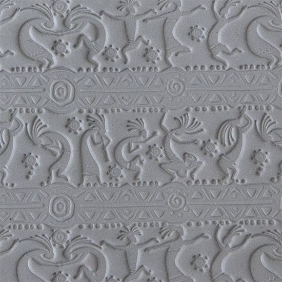 sample in clay of Mega Texture Tile - Dancing Spirits. Use to impress texture in soft clays. Mega Texture Tiles are perfect for projects both large and small. Mega Tiles measure 9-1/4" x 6" and are about 7 times larger than Texture Tiles. These textures are flexible, washable and can be used with any soft clay.